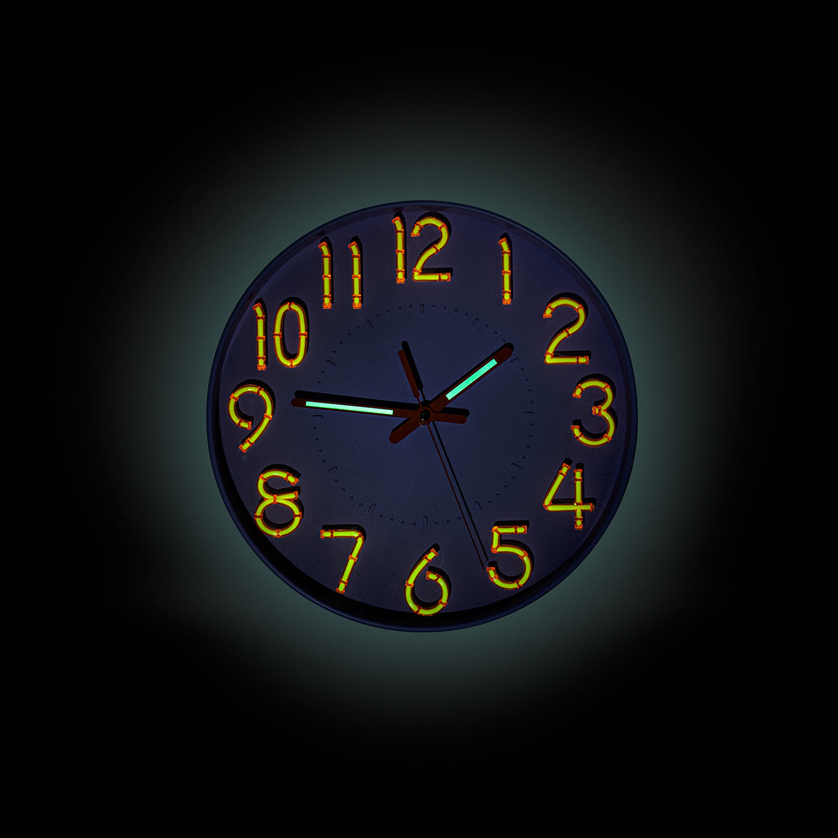 Glow in the dark wall clock by Flying Tiger Copenhagen, showing luminous numbers and hands on a modern home decor clock.