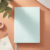 Blue A5 bullet planner from Flying Tiger Copenhagen, featuring a compact office organizer with numbered pages and a durable cover.
