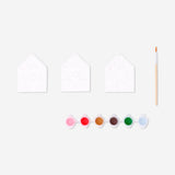 Set of three DIY ceramic house ornaments for hobbies, featuring detailed painted designs, by Flying Tiger Copenhagen.