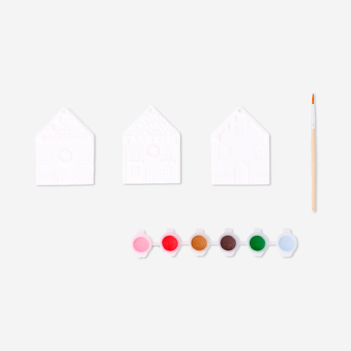 Set of three DIY ceramic house ornaments for hobbies, featuring detailed painted designs, by Flying Tiger Copenhagen.