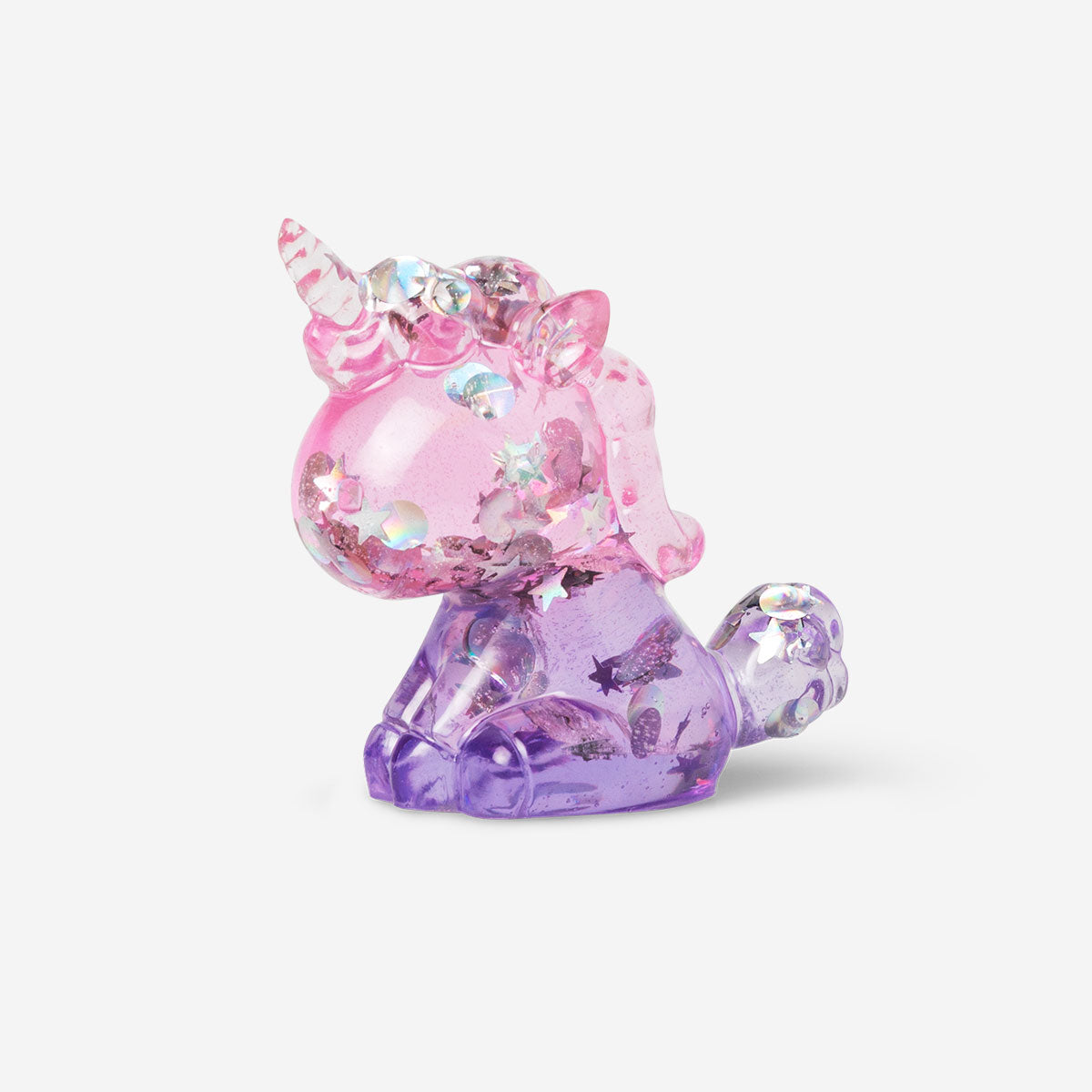 DIY crystal unicorn hobby kit with colorful crystals and a unicorn figure, designed for creative craft projects by Flying Tiger Copenhagen.