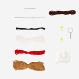 Colorful DIY crochet mini dog hobby kit from Flying Tiger Copenhagen with yarn and crochet tools for crafting a small dog figure.