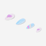 Flying Tiger Copenhagen heart and rainbow press-on nails for personal care, featuring colorful, playful nail designs.