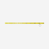 Yellow mini folding ruler key ring gadget from Flying Tiger Copenhagen, showing its compact, foldable design with keyring attachment.