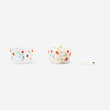 Two party bowls with strawberry print from Flying Tiger Copenhagen, perfect for summer gatherings and dessert serving.