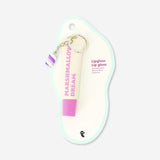 Flying Tiger Copenhagen lip gloss with charm, marshmallow fragrance, shiny finish, and decorative charm for personal care.
