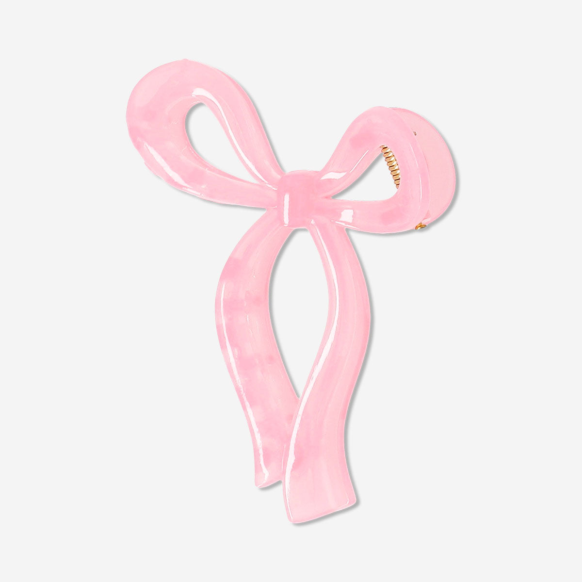 Pink textile bow hairclip with a decorative bow design, suitable for girls, by Flying Tiger Copenhagen.