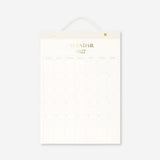 Hanging 2027 monthly office calendar by Flying Tiger Copenhagen with colorful month layouts on white background.