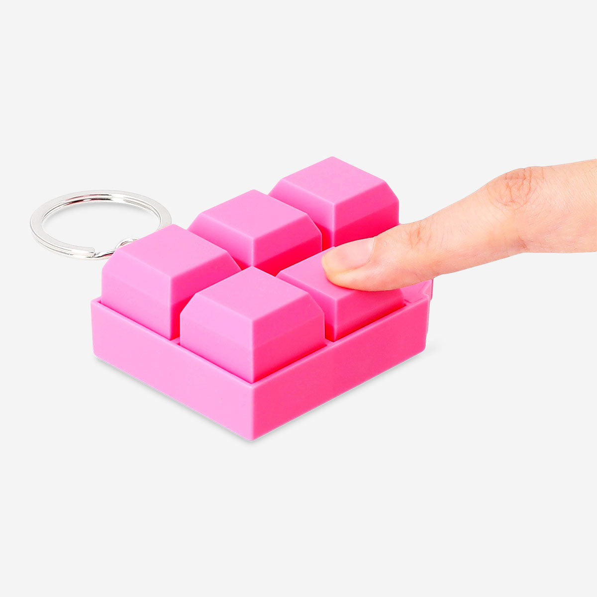 Pink chocolate bar clicking keyring gadget from Flying Tiger Copenhagen, featuring a playful chocolate bar design with a clicking mechanism.