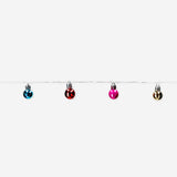 Colorful string lights with multi-colored baubles for home decoration, by Flying Tiger Copenhagen.
