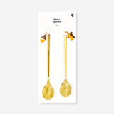Set of two gold dessert spoons with acorn and squirrel decorations, ideal for elegant kitchen table settings.