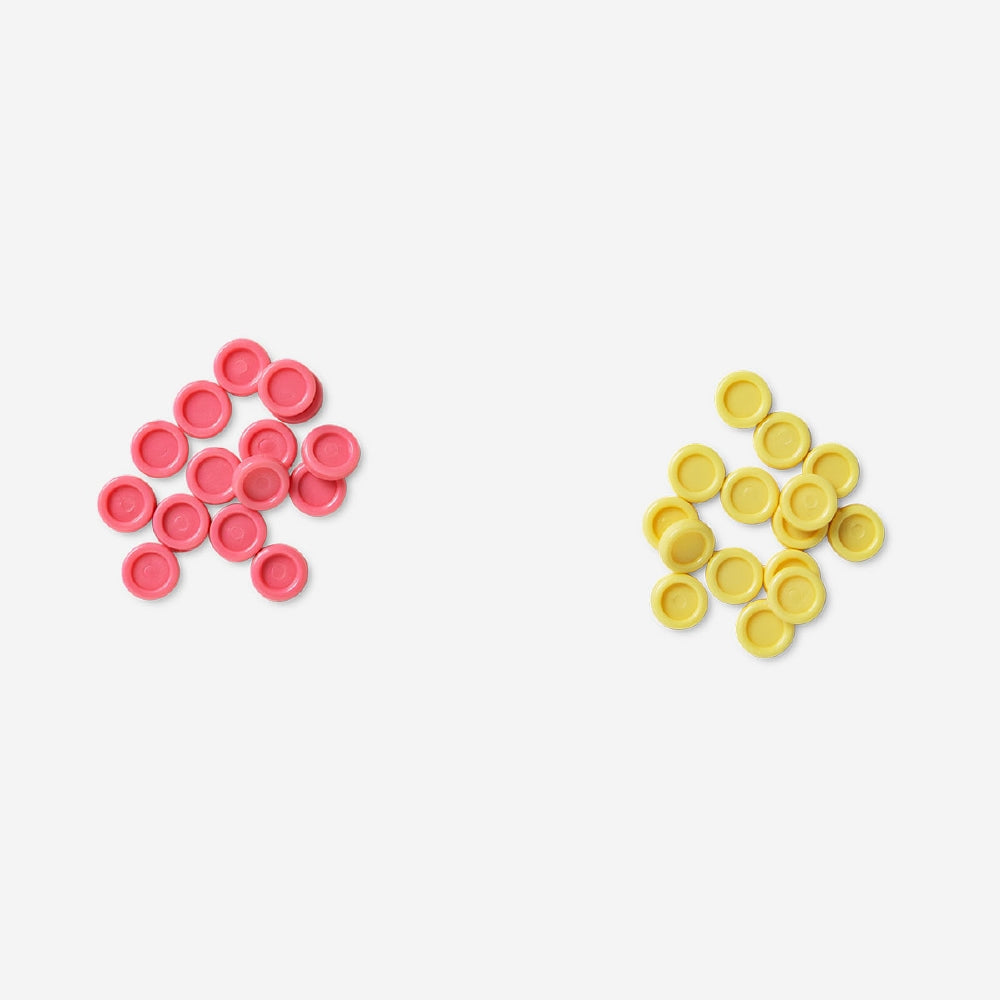 Mini Four in a Row game by Flying Tiger Copenhagen, showing colorful plastic game pieces and grid for two players.