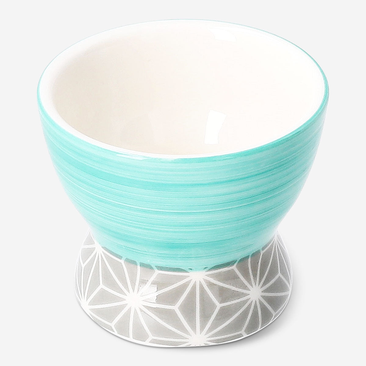 Flying Tiger Copenhagen geometric print sake jug and cup set, featuring modern design with bold patterns and ceramic craftsmanship.