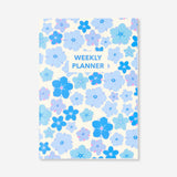 Flying Tiger Copenhagen B5 blue floral weekly planner for office use, featuring a colorful floral design on the cover.