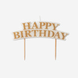 Colorful Happy Birthday cake candle from Flying Tiger Copenhagen for party celebrations, featuring festive design and bright colors.