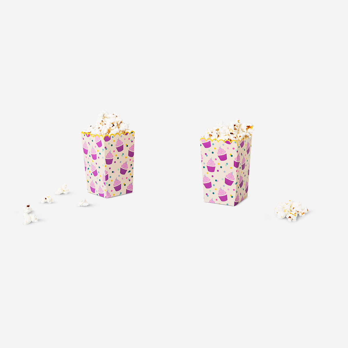 Two Flying Tiger Copenhagen paper snack tubs for parties, featuring colorful designs, ideal for serving snacks at gatherings.