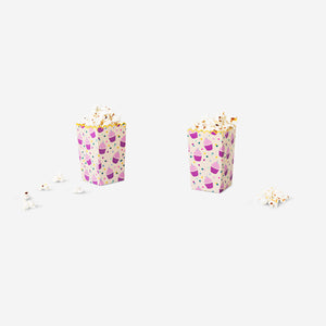 Two Flying Tiger Copenhagen paper snack tubs for parties, featuring colorful designs, perfect for serving snacks at gatherings.