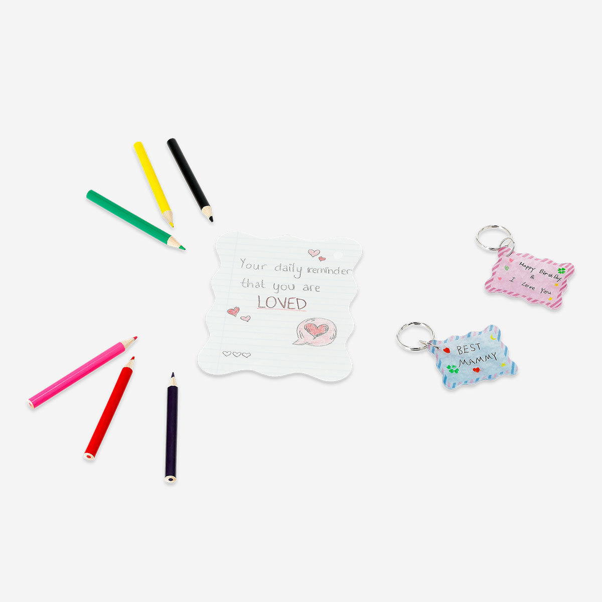 Colorful DIY keyrings made with shrink plastic from Flying Tiger Copenhagen, showcasing creative hobby craft designs.