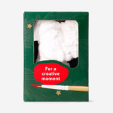 DIY plaster Christmas figures hobby kit by Flying Tiger Copenhagen, showing unpainted festive holiday figurines on a work surface.
