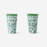 Two tall reusable party cups with summer print from Flying Tiger Copenhagen, featuring colorful tropical designs.