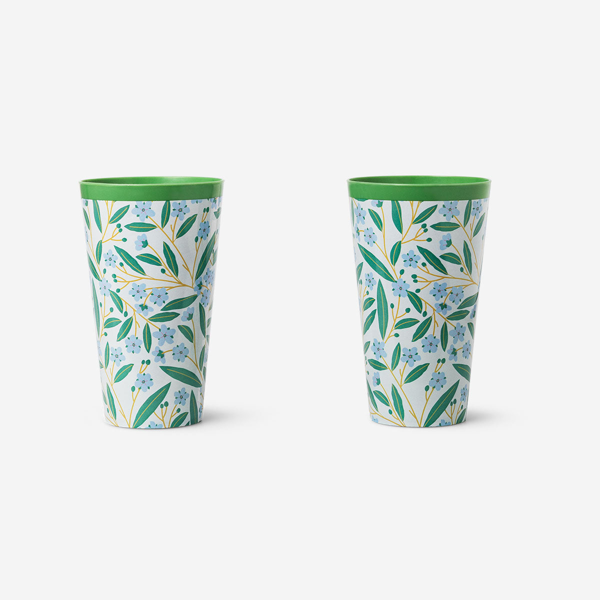 Two tall reusable party cups with summer print from Flying Tiger Copenhagen, featuring colorful tropical designs.