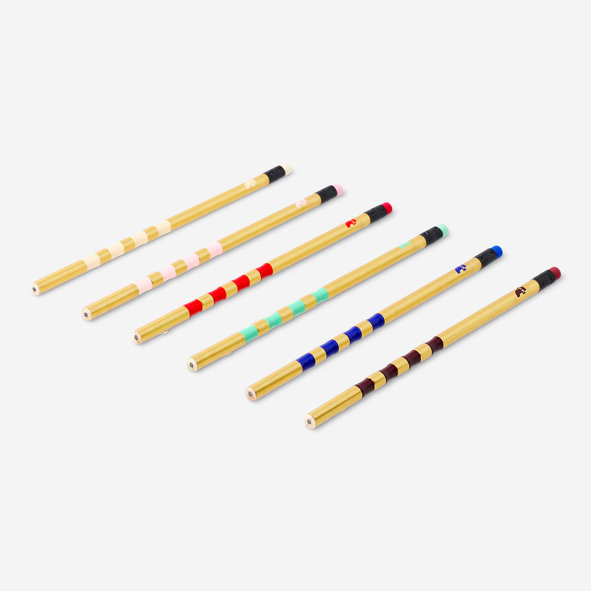 Set of 6 gold office pencils by Flying Tiger Copenhagen arranged on a white background.