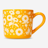 Flying Tiger Copenhagen 450ml autumnal print ceramic mug, kitchenware with fall leaf design and vibrant colors.