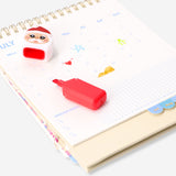 Set of four Christmas-themed highlighters from Flying Tiger Copenhagen with festive colors and holiday designs for office use.