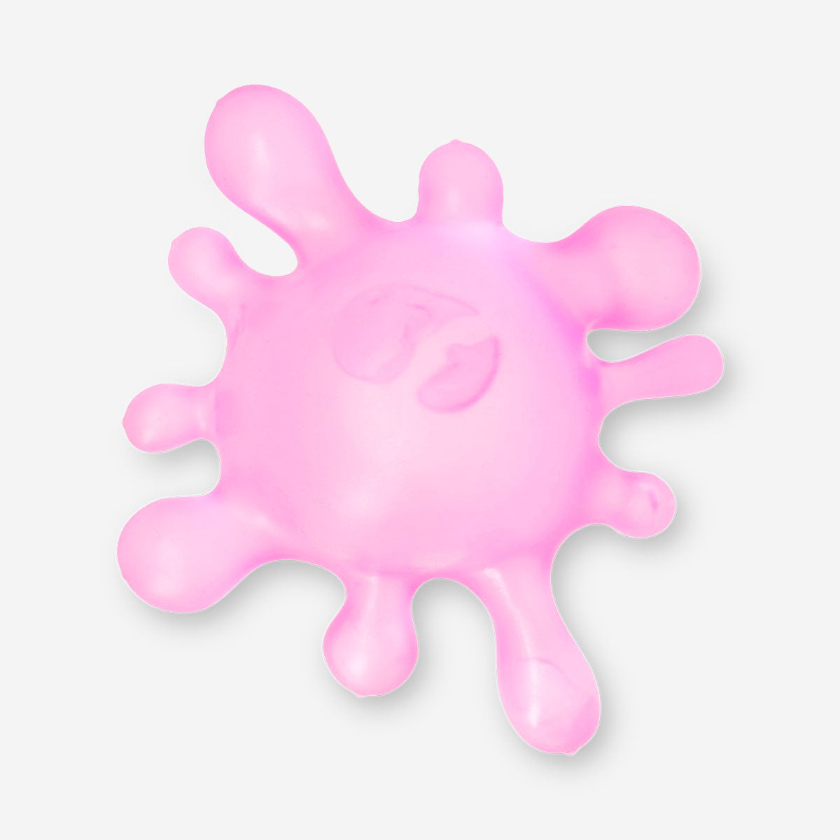 Pink splatter Press Me gadget toy from Flying Tiger Copenhagen, featuring a colorful, squeezable design for stress relief and fun.
