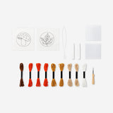 Two DIY punch needle coasters in vibrant colors, crafted for hobby crafting by Flying Tiger Copenhagen.