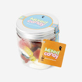 Colorful candies in a cup from Flying Tiger Copenhagen, featuring a variety of sweet treats and vibrant packaging.