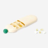 Flying Tiger Copenhagen pill organizer with slide mechanism, compact leisure storage for daily medication or supplements.