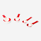 Set of four ceramic Santa measuring spoons from Flying Tiger Copenhagen, ideal for kitchen baking and cooking.