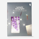 Purple string lights with clips from Flying Tiger Copenhagen, ideal for home decor and cozy lighting.