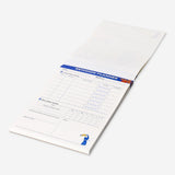 Flying Tiger Copenhagen revision planner pad with colorful pages for organizing tasks and study schedules in an office setting.