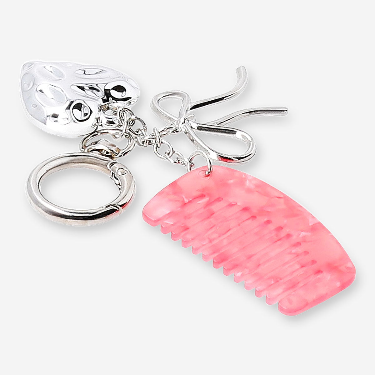 Flying Tiger Copenhagen textile keyring with hair comb and decorative charms, designed for easy attachment and everyday use.
