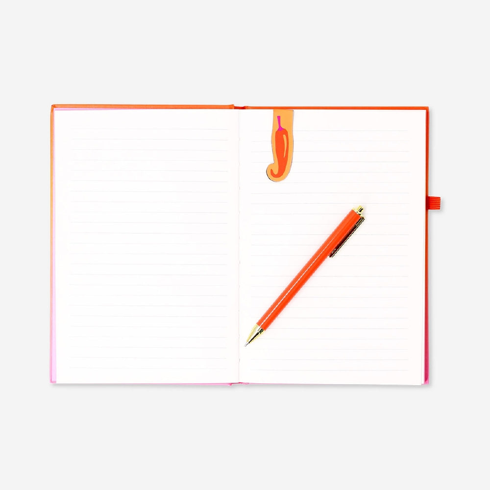 Gradient office notebook with magnetic bookmark and pen by Flying Tiger Copenhagen, open showing colorful pages and accessories.
