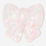 Pink Press Me Toy fidget bow gadget from Flying Tiger Copenhagen, colorful squeeze toy for stress relief and sensory fun.