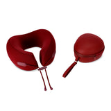 Memory foam travel pillow with storage case by Flying Tiger Copenhagen, shown in a compact, portable design for comfortable travel.