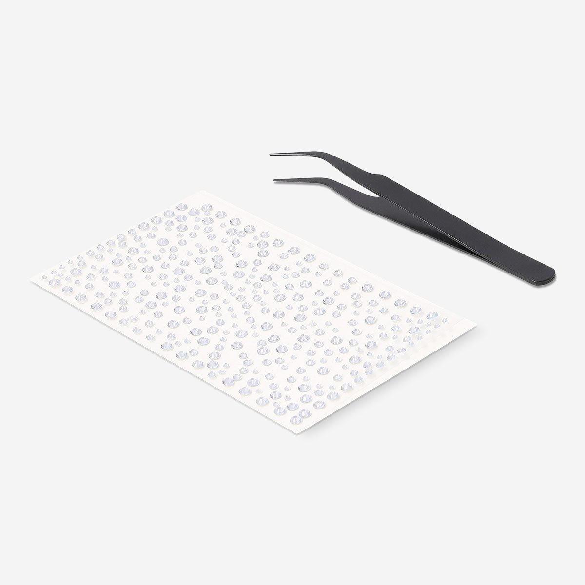 Flying Tiger Copenhagen nail decorating kit with colorful rhinestones for personal care and creative nail art.