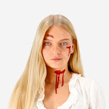 Flying Tiger Copenhagen fake blood for skin with temporary tattoos, showing realistic red blood effect on skin.