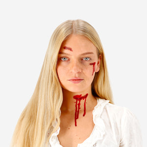 Flying Tiger Copenhagen fake blood for skin with temporary tattoos, featuring realistic red blood effects and fun body art designs.