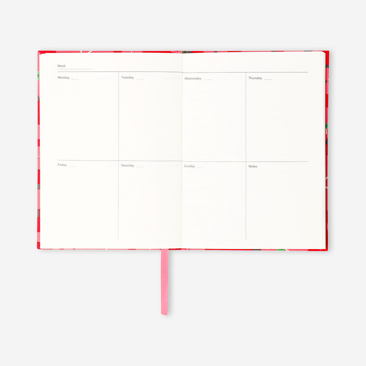 Red floral weekly planner from Flying Tiger Copenhagen with colorful flower patterns on a smooth cover.