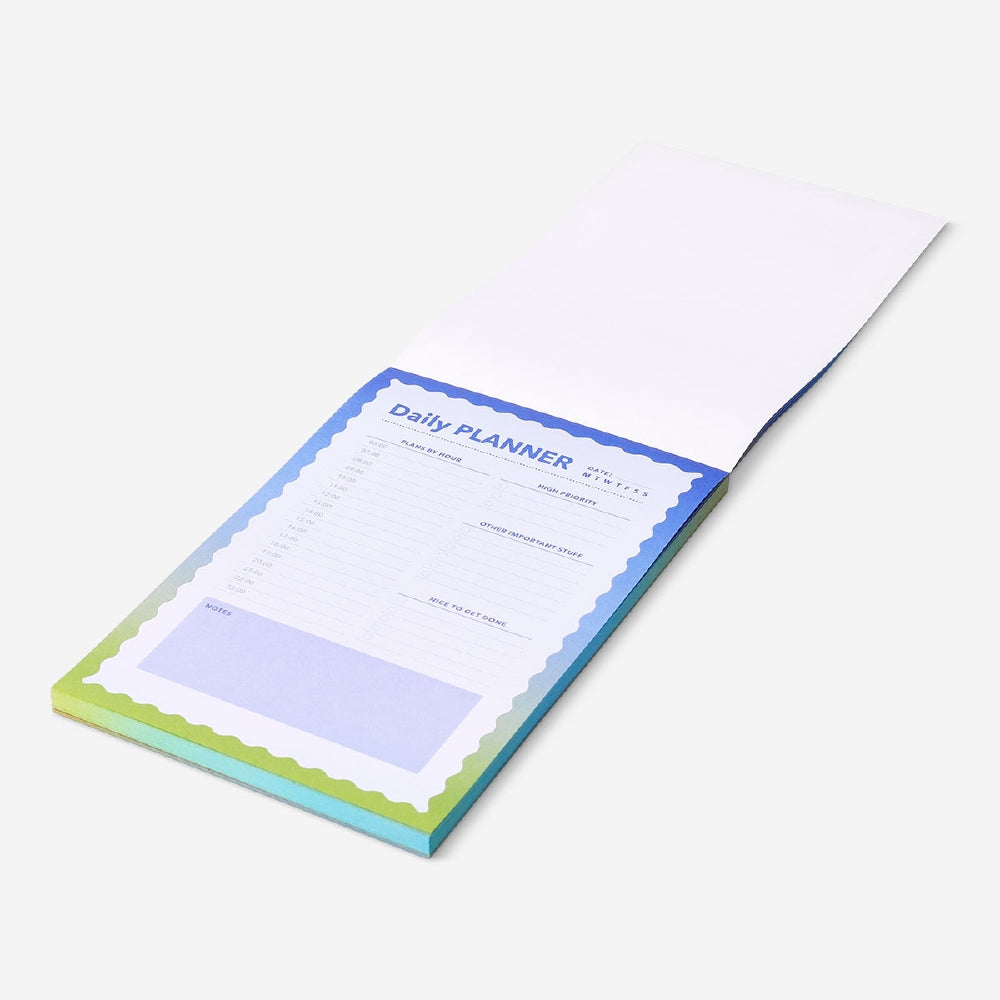 Blue Flying Tiger Copenhagen daily planner notepad for office use, featuring a compact design with daily planning pages.