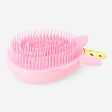 Flying Tiger Copenhagen unicorn hairbrush with colorful bristles, designed for personal care and styling.