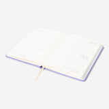 Purple A5 daily diary for 2027 by Flying Tiger Copenhagen, featuring a sleek office style cover and weekly layout inside.