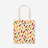 Colorful textile tote bag with chili pepper print from Flying Tiger Copenhagen, featuring sturdy handles and spacious interior.