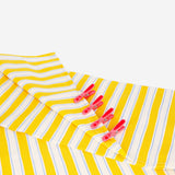 Pink flower-shaped clothes pegs in a 12-pack, Flying Tiger Copenhagen home laundry accessories, displayed with flower design details.