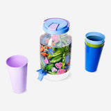Flying Tiger Copenhagen drink dispenser with five cups, ideal for parties, featuring a clear container and colorful reusable cups.