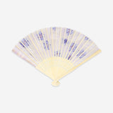 Foldable bamboo fan with abstract purple textile design, lightweight and portable accessory by Flying Tiger Copenhagen.